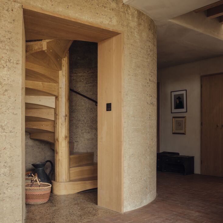 a rammed earth turret is designed with an oak staircase completed with the expe 31