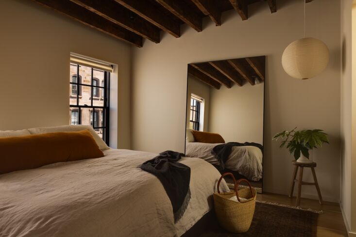 a large pulley hung on the top floor in place of the couple\2\17;s bed.  31