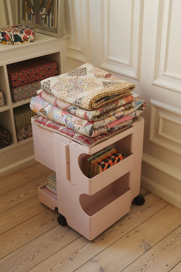 a vintage pink joe colombo trolley holds \2\20;some of my many textiles 29