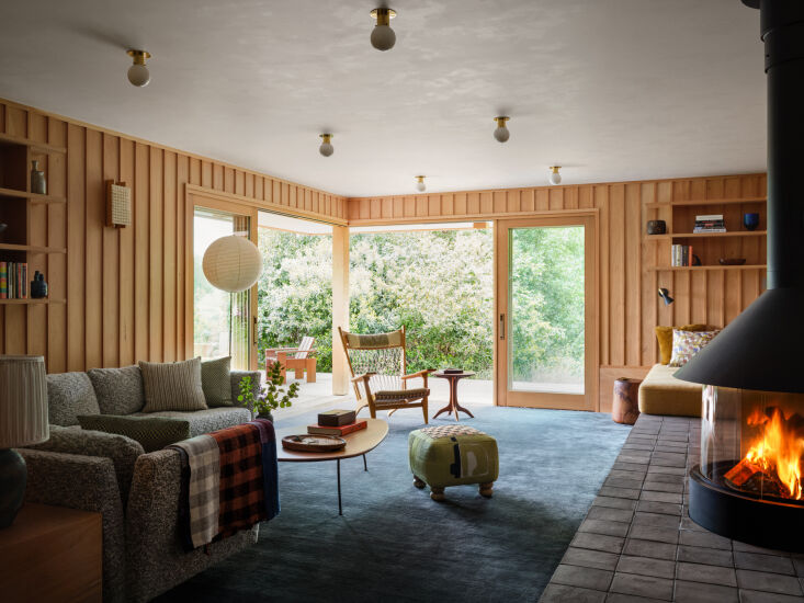 a central wood burning stove with terracotta tile from exquisite surfaces. a vi 20
