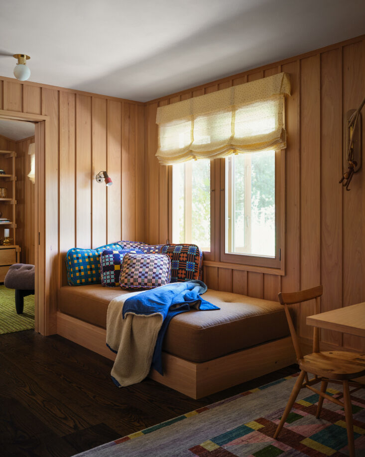 a daybed decorated with gregory parkinson assamese blanket pillows and the fre 26