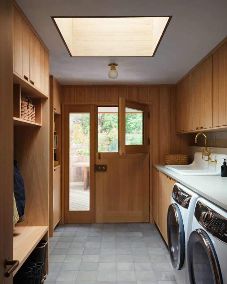in the mudroom/laundry, floor tiles are terracotta from exquisite surfaces. 37