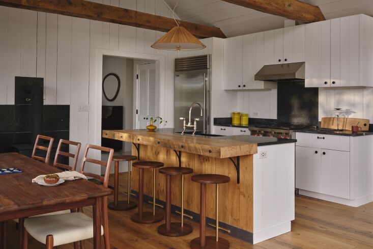 a simple kitchen echoes the nautical nature of the rest of the house with white 22