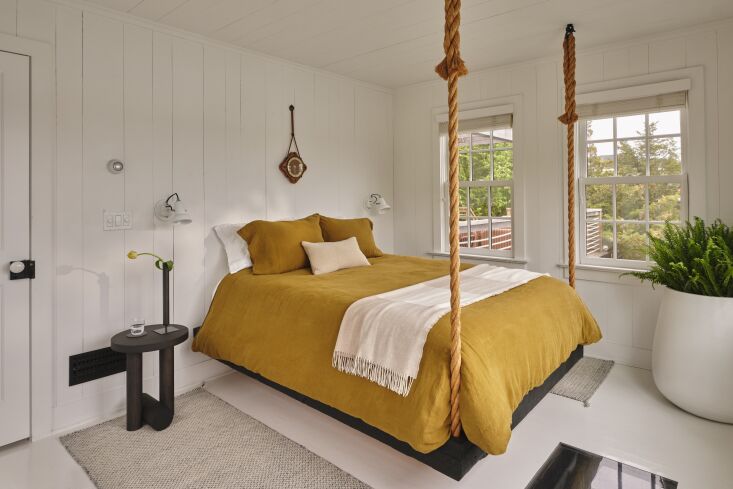 the hanging boat bed is suspended with heavy rope in a traditional ship\ 30