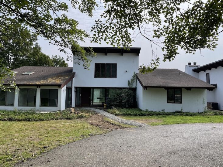 the house came with \2\20;very steep shed roofs that were popular in the 31