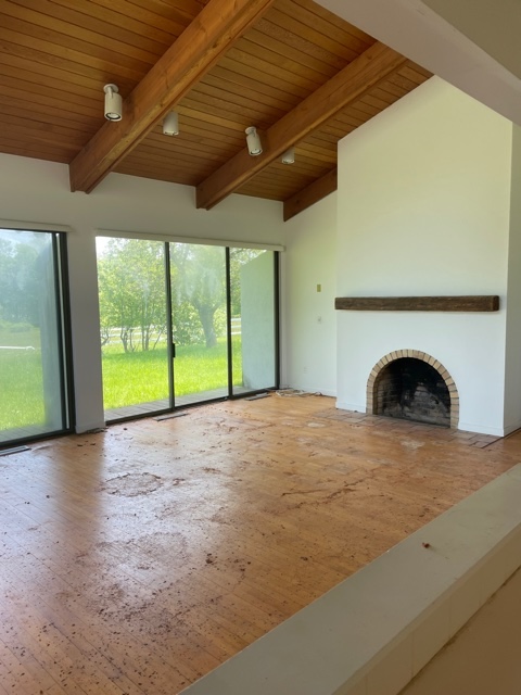 the living room had been divided from the kitchen and dining area. 32