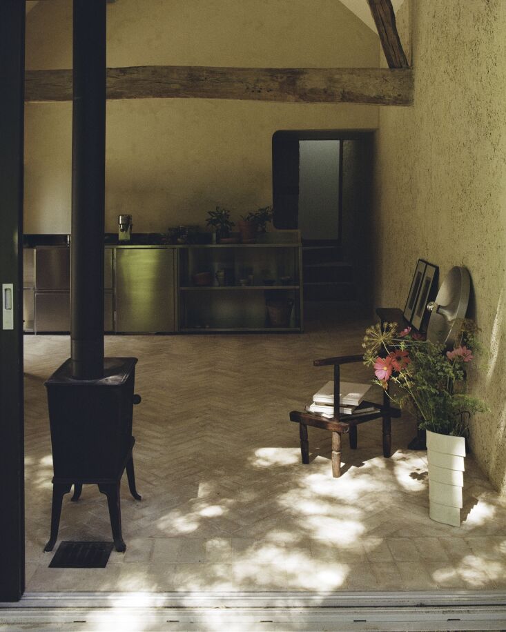 the main open space serves as both living/studio area with an open kitchen deve 20