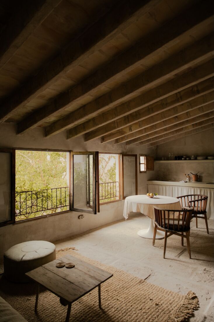 the upstairs guest quarters include a living area and kitchen. 25