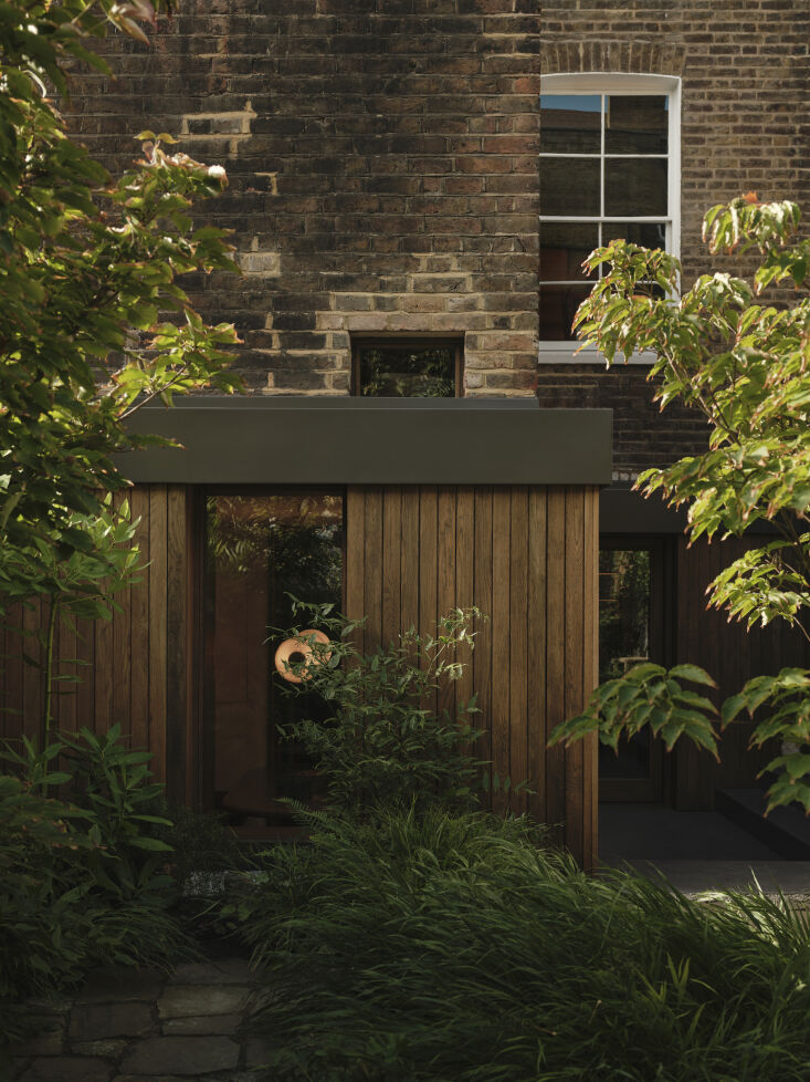louis spent five months finding an exterior stain to match the smokey hue of th 33