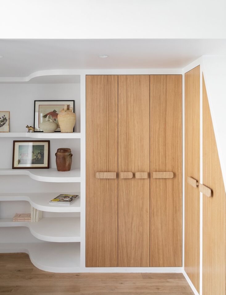 curved walls soften the apartment\2\17;s boxy shell. borgia designed cus 20