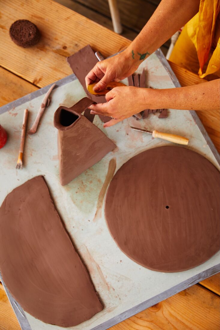 camille specializes in slab built designs. here, she\2\17;s at work on a 20