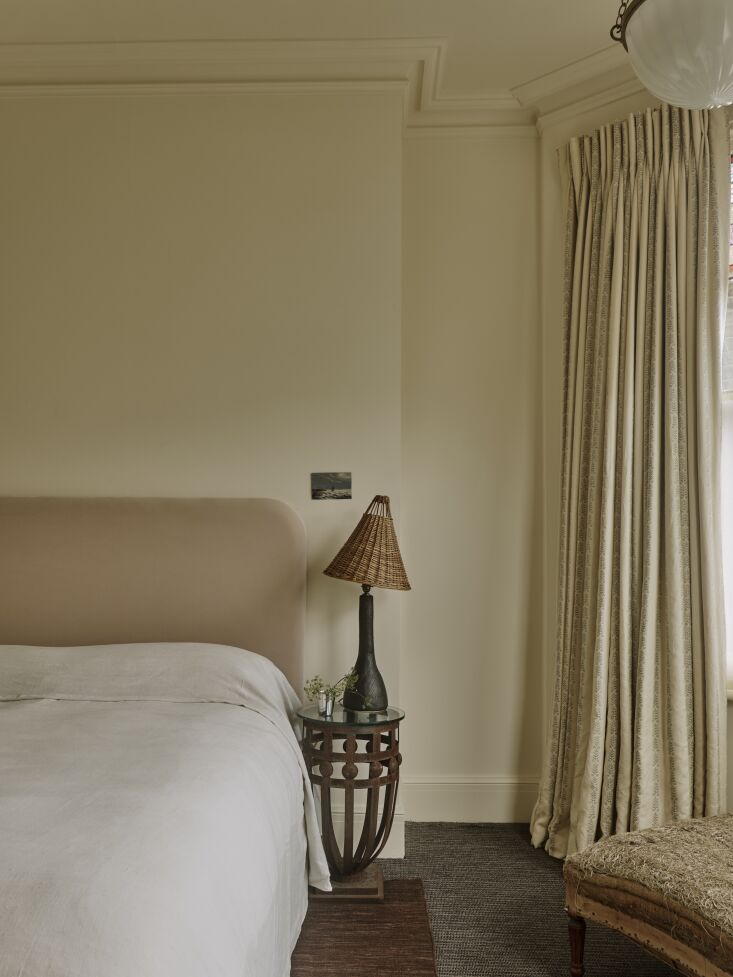 the silk velvet headboard is handmade in a fabric by rose uniacke and the wicke 33