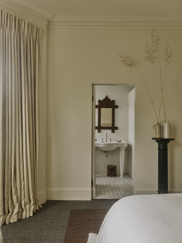 a stealth bath opens from the primary bedroom. 34
