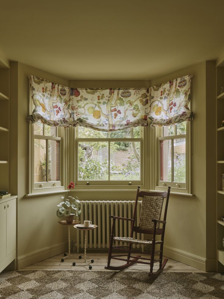 roman shades are made from a fruit tree print by josef frank for svenskt tenn. 27