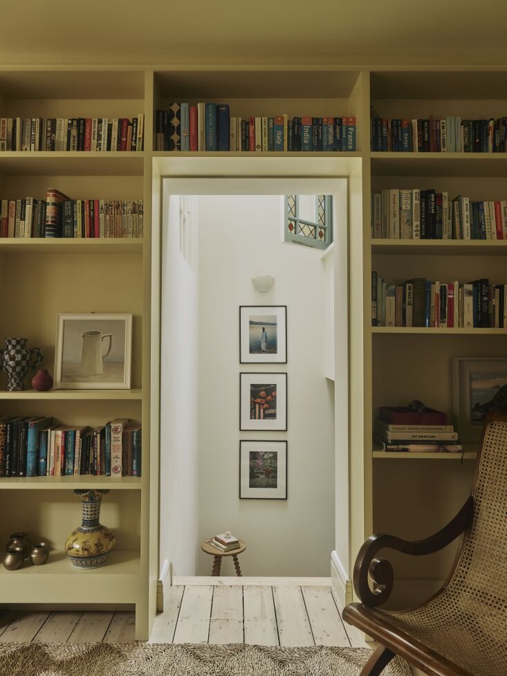 the library\2\17;s walls and integrated cabinetry are painted warm stone 28