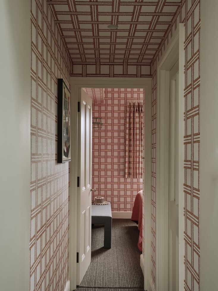 a checkered bedroom beyond is carried into the hallway just before entering. 36