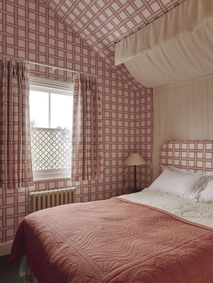 the characterful checkered bedroom features wallpaper and curtains by anna will 37