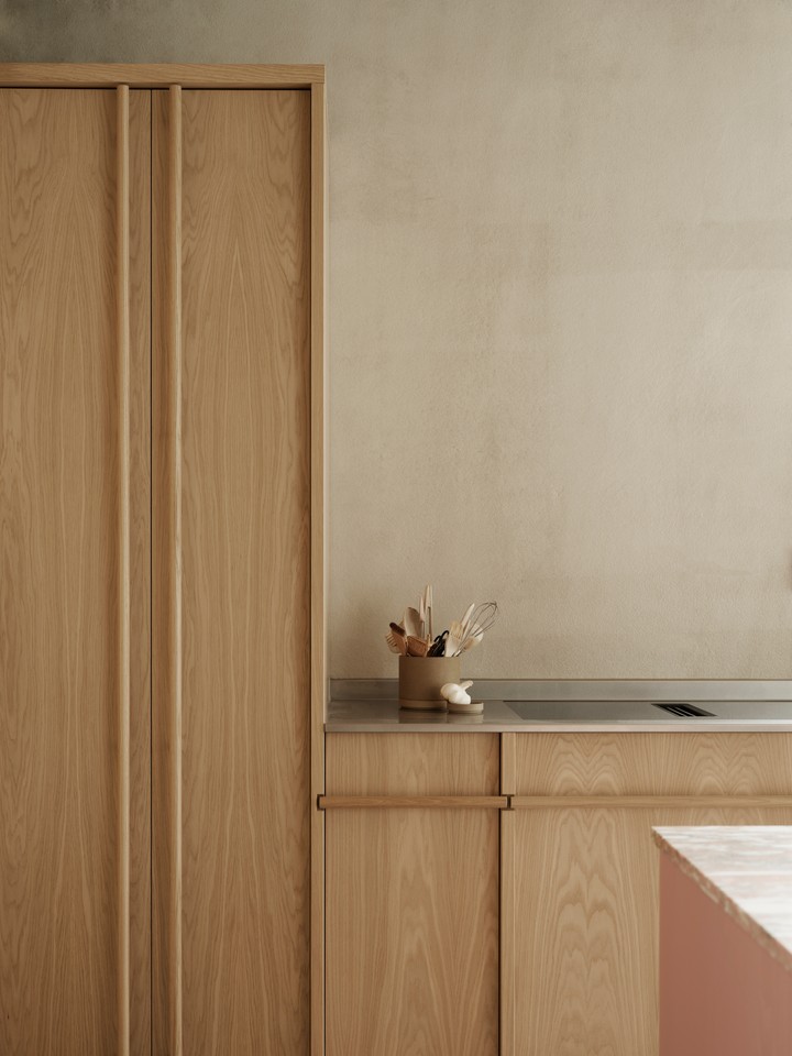 tall oak cabinetry seamlessly conceals the fridge and freezer as well as a pant 20