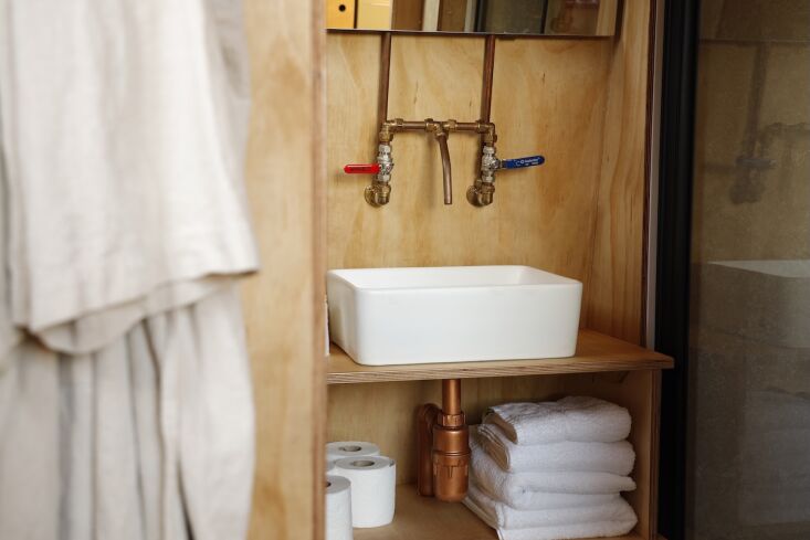 the sinks have copper piping faucets. 21