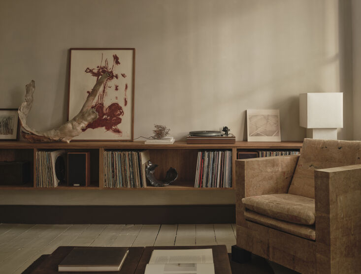 the sitting room, with its pair of david horan armchairs, begins to hint at the 19