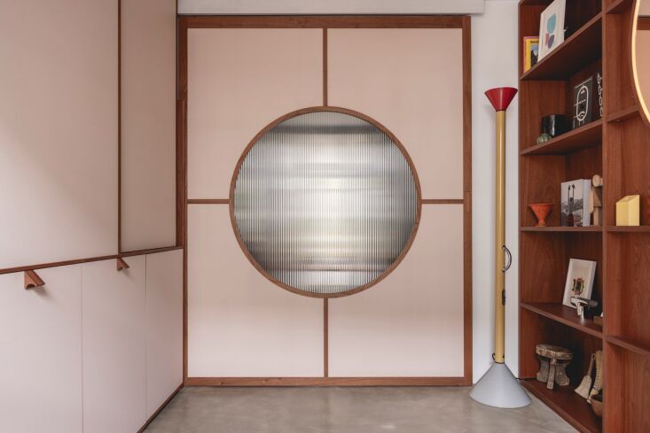 light carries through interior windows; an ettore sottsass callimaco led floor  28