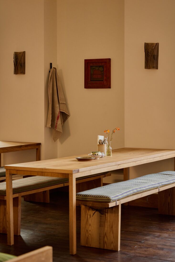 the minimalist communal tables and benches are quarter sawn oak and sweet chest 25