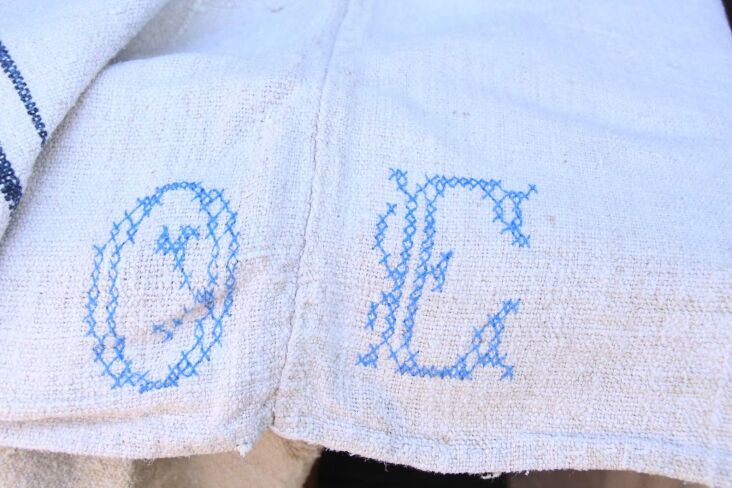 a detail of the embroidered initials. as with vintage postcards or snapshots, i 20