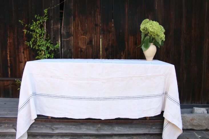 the handwoven antique linen blanket from the speciality shop grainsack on etsy 18