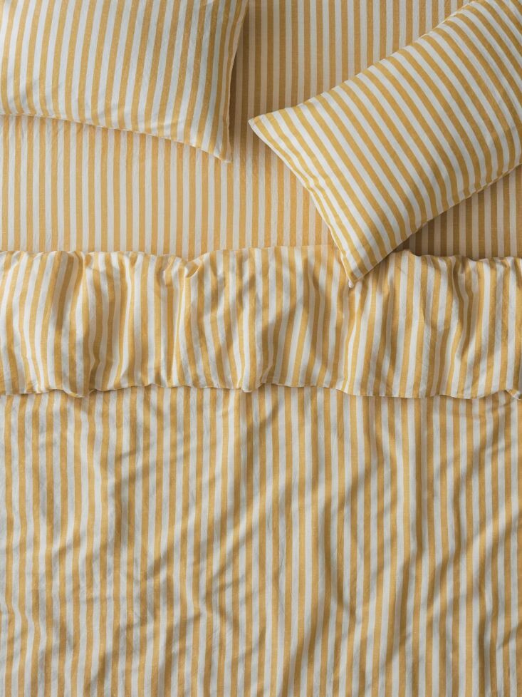 annie loves this striped duvet cover for the feeling of summer well into septem 19