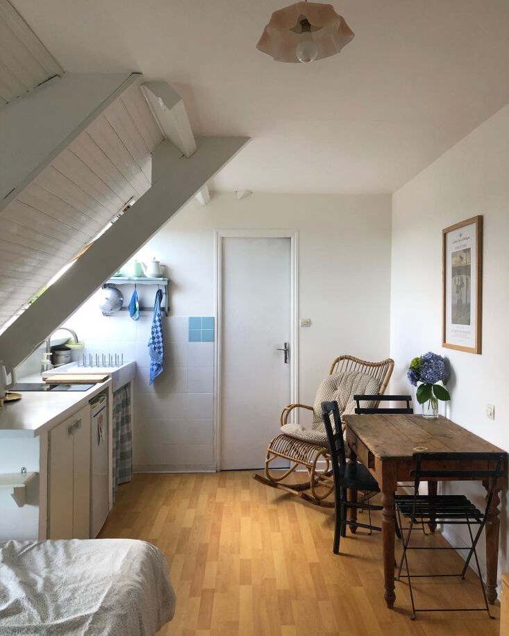 the attic studio occupies the top floor beneath the roofline, with oversized sk 28