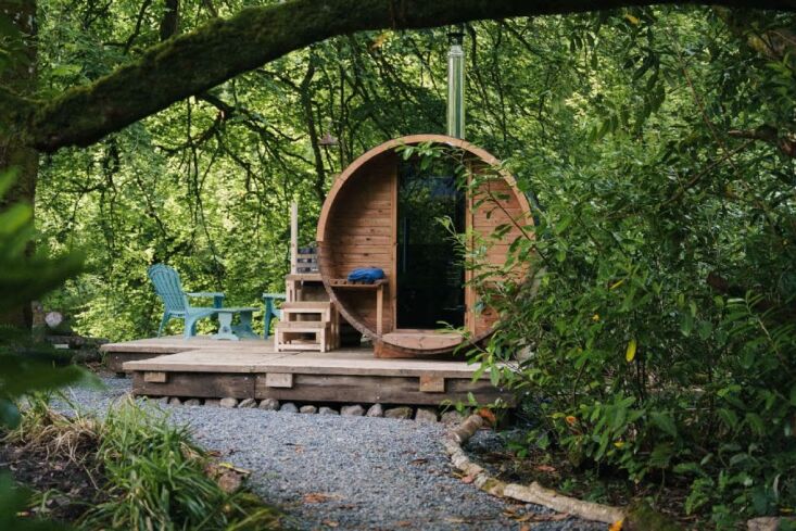 the cabin comes with a barrel sauna overlooking the river—and a cold plunge, 32