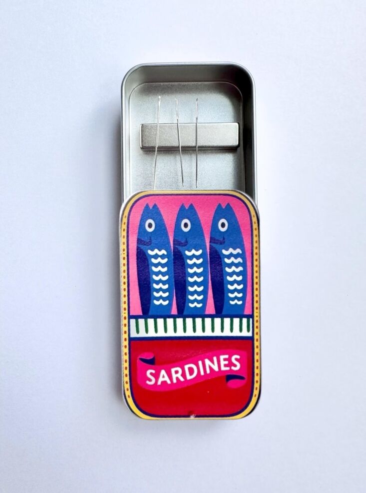the magnet holds sewing needles in place in this needle case from etsy seller  23