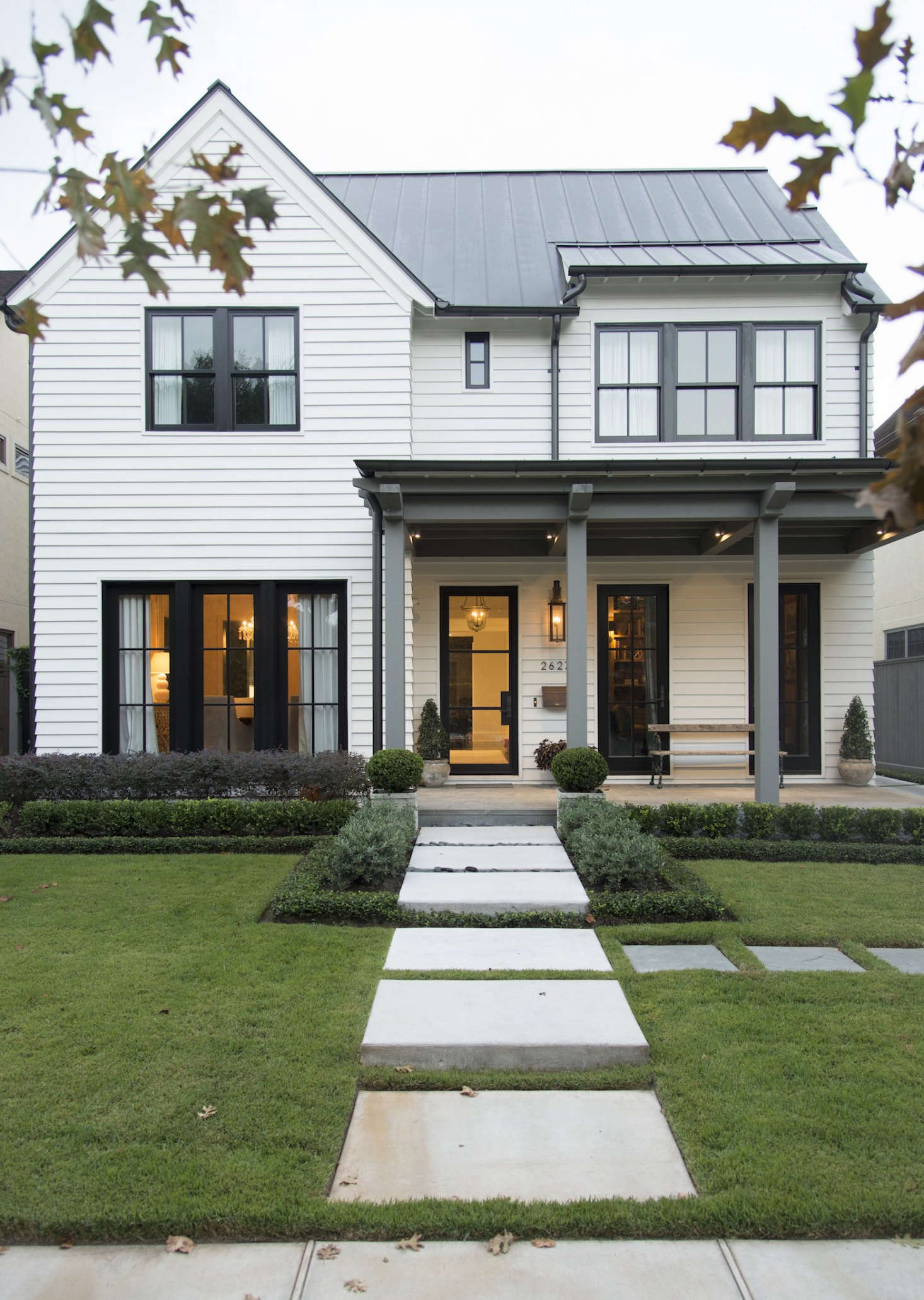 A superior exterior paint job not only makes for a great first impression, it also protects your home from the elements. Curb Appeal finalist in our Considered Design Awards, the Granberry Residence in Houston, Texas, demonstrates. Photograph by Megan Lovoi.